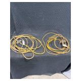 Two Yellow Extension Cords