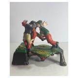 VINTAGE "CALAMITY" CAST IRON MECHANICAL COIN BANK - FOOTBALL/RUGBY THEME