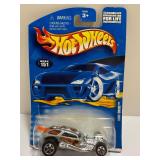 Hot Wheels Lot of 9 Die-Cast Cars NIP (New In Package) - 1999 First Editions & 2006 New Models - Pikes Peak Tacoma, Bone Shaker, Hemi Challenger & More!