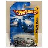 Hot Wheels Lot of 9 Die-Cast Cars NIP (New In Package) - 1999 First Editions & 2006 New Models - Pikes Peak Tacoma, Bone Shaker, Hemi Challenger & More!