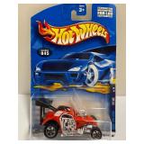 Hot Wheels Lot of 9 Die-Cast Cars NIP (New In Package) - 1999 First Editions & 2006 New Models - Pikes Peak Tacoma, Bone Shaker, Hemi Challenger & More!