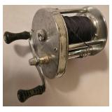 LL-FR - Pair of Fishing Reels Including Johnson Spincast and Conventional Reel