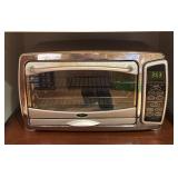 K - Oster Toaster Oven with Digital Controls Model: Model 6058-126-001