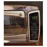 K - Oster Toaster Oven with Digital Controls Model: Model 6058-126-001
