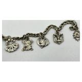 Vintage Silver-Tone Charm Bracelet with 8 Unique Charms