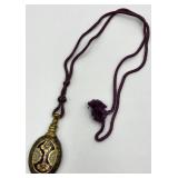 Ornate Brass Perfume Flask with Decorative Cord