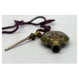 Ornate Brass Perfume Flask with Decorative Cord