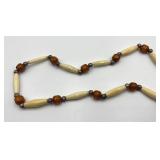 Large Butterscotch Amber Color Beads and Silver Bell Pendant