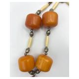 Large Butterscotch Amber Color Beads and Silver Bell Pendant