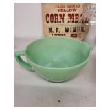 Vintage Kitchenware Collection with Texas Ware Bowl, Fire-King Cup, Glass Jar, and Feed Mill Sack