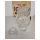 Vintage Kitchenware Collection with Texas Ware Bowl, Fire-King Cup, Glass Jar, and Feed Mill Sack