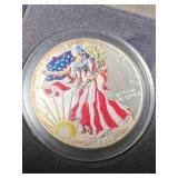 1999 AMERICAN SILVER EAGLE 1 TROY OZ .999 FINE SILVER IN COLOR