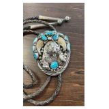 Sterling Hand Made Bolo tie with turquoise and bear claws!