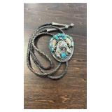 Sterling Hand Made Bolo tie with turquoise and bear claws!