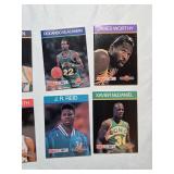 Lot of 12 NBA Hoops Collect A Books Featuring Larry Bird, Scottie Pippen, and Akeem Olajuwon