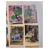 Lot of 15 Boston Celtics Basketball Cards Featuring Players like Kyrie Irving, Larry Bird, Jaylen Brown, Bill Russell and Others