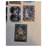 Lot of 15 Boston Celtics Basketball Cards Featuring Players like Kyrie Irving, Larry Bird, Jaylen Brown, Bill Russell and Others