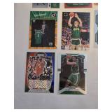 Lot of 15 Boston Celtics Basketball Cards Featuring Players like Kyrie Irving, Larry Bird, Jaylen Brown, Bill Russell and Others