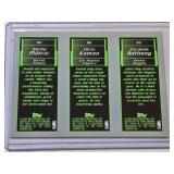 2003-04 Topps Rookie Matrix basketball trading card featuring LeBron James, Carmelo Anthony, and either Darko Milicic or Chris Kaman