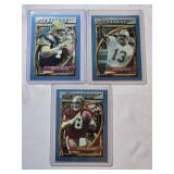 Lot of 3 Topps Finest Football Cards Featuring Dan Marino, Steve Young, and Brett Favre.
