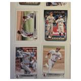 Lot of 16 Shohei Ohtani Baseball Cards with Various Sets and Features Including "Elites of the Game" and "100 Career Home Runs".