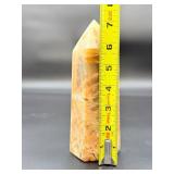 A large regular moonstone generator tower featuring a smooth, creamy sheen with gentle pearlescent glow.