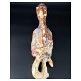 This Red Jasper dragon is a carved symbol of strength, courage, and grounding.