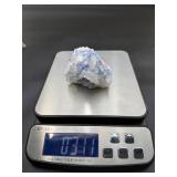 Blue Halite Crystal is a translucent cluster of soft blue cubic formations, exuding a calm, cooling energy.
