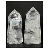 Two mesmerizing Crackle Quartz tower, its interior fractured patterns catching the light likefrozen lightning.