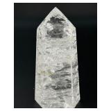 Two mesmerizing Crackle Quartz tower, its interior fractured patterns catching the light likefrozen lightning.