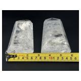 Two mesmerizing Crackle Quartz tower, its interior fractured patterns catching the light likefrozen lightning.