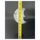 A luminous Botswana Agate druzy carved into a moon shape, showcasing delicate bands of soft gray, caramel, and cream. The sparkling druzy surface catches the light, in a custom metal stand.