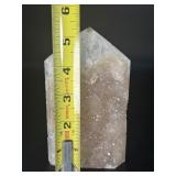 A delicate druzy Golden Healer quartz tower sparkling with a natural crust of tiny crystals atop warm golden tones. Slender and radiant, it amplifies healing, light.