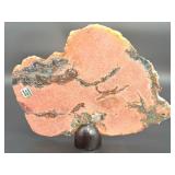 A stunning extra-large pink amethyst slice, glowing with soft rosy hues and natural crystalline texture.