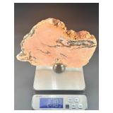 A stunning extra-large pink amethyst slice, glowing with soft rosy hues and natural crystalline texture.