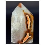 An Agate Druzy Tower is a striking crystal piece that blends the grounding beauty of agate with the sparkling magic of natural druzy formations.