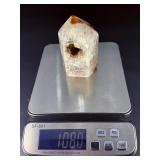 An Agate Druzy Tower is a striking crystal piece that blends the grounding beauty of agate with the sparkling magic of natural druzy formations.