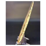 An Agate Slice (Raw) showcases the natural beauty of agate in its most organic form.