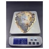 An Agate Slice (Raw) showcases the natural beauty of agate in its most organic form.