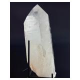 A Brazilian Clear Quartz Point is a powerful and timeless crystal. This naturally formed point features a polished or semi-polished body with a sharp, fully terminated tip, allowing energy to flow smo