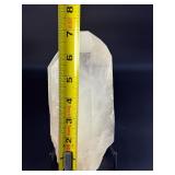 A Brazilian Clear Quartz Point is a powerful and timeless crystal. This naturally formed point features a polished or semi-polished body with a sharp, fully terminated tip, allowing energy to flow smo