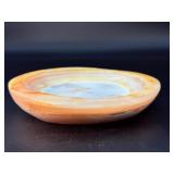 Agate dish is a beautifully polished, hand-carved piece that highlights the natural banding and rich earthy tones of agate.