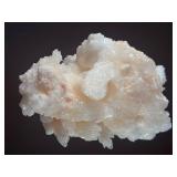 Peach Stilbite is a delicate and captivating crystal known for its soft, peachy-pink color and intricate, fan-like formations. Often found in clusters, the crystal’s radiating, layered structures ca