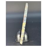 Banded Amethyst Agate (Polished) is a stunning crystal piece that combines the deep, rich purples of amethyst with the layered, earthy tones of agate.