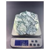 Large Hand-Carved Moss Agate Leaf is a beautifully sculpted piece that showcases the natural beauty of moss agate in a graceful, leaf-shaped form.