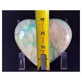 Quantum Quattro Heart is a striking, multi-faceted crystal heart that combines four powerful stones—typically Clear Quartz, Amethyst, Smoky Quartz, and Citrine—into one harmonious piece.