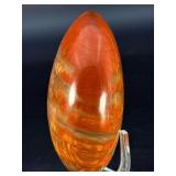 Petrified Wood Moon is a beautifully carved piece that captures ancient earth energy in a graceful moon shape.