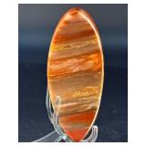 Petrified Wood Moon is a beautifully carved piece that captures ancient earth energy in a graceful moon shape.
