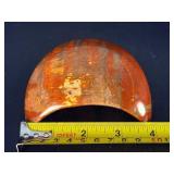 Petrified Wood Moon is a beautifully carved piece that captures ancient earth energy in a graceful moon shape.