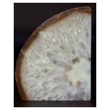 Agate Quartz with Slight Rainbows is a captivating natural stone that blends the grounding beauty of agate with the clarity and light play of quartz.